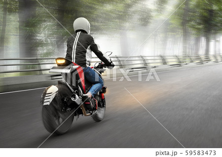 Rear view of Asian motorcycle taxi man driving 59583473