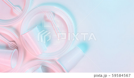 Disposable plastic tablewar on a light background in pastel colors. Minimalistic ecologically clean 59584567