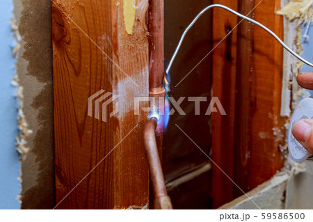 Closeup professional master plumber hands Closeup professional master plumber hands 59586500