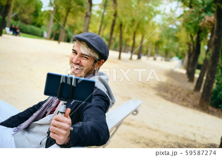 Millennial Man Recording Vlog With Mobile Phone For Social Media 59587274