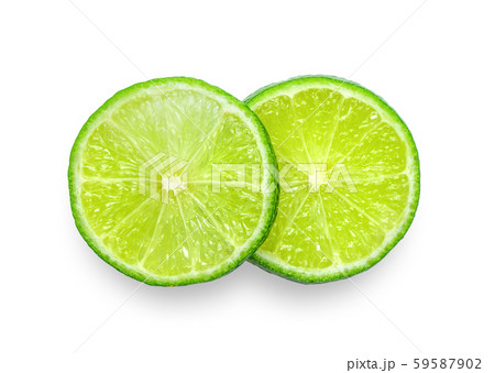 Juicy slice of lime isolated on white background. Juicy slice of lime isolated on white background. 59587902