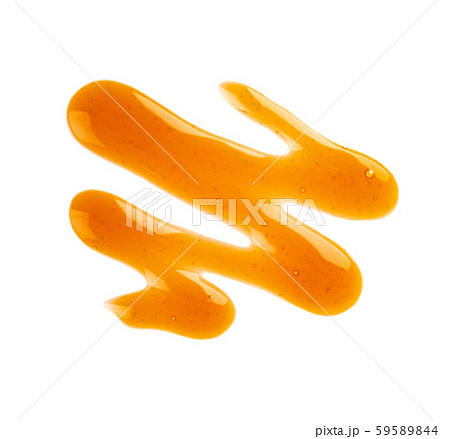 Caramel syrup drizzle isolated on white background. Splashes of sweet caramel sauce. Top view. 59589844