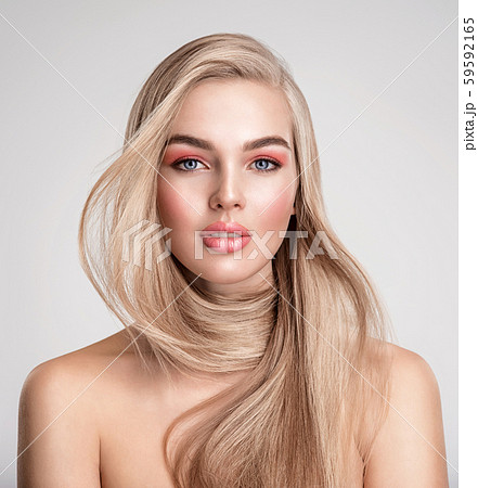 Portrait of a blonde beautiful woman with a long 59592165
