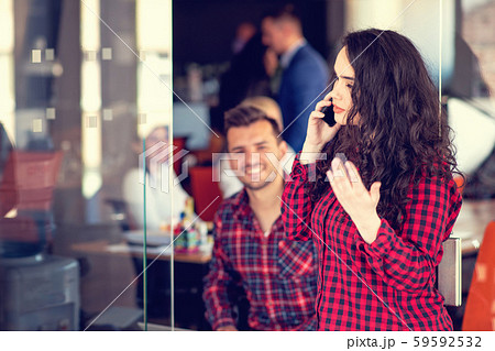 Close up photo of beautiful business lady look side speak communicate telephone smart phone office Close up photo of beautiful business lady look side speak communicate telephone smart phone office 59592532