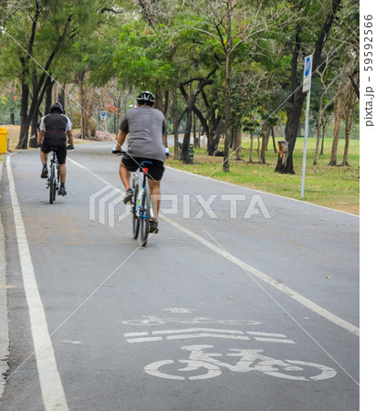 Riding bicycle in the park Riding bicycle in the park 59592566