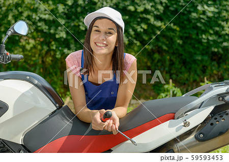 pretty brunette girl in motorbike mechanics pretty brunette girl in motorbike mechanics 59593453