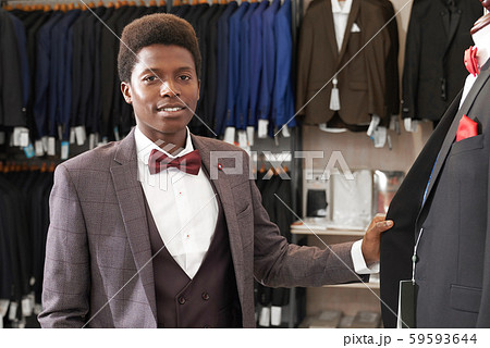 Portrait of african man in fashionable boutique. 59593644
