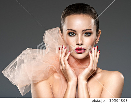 fashion woman with stylish makeup, red nails and 59594393
