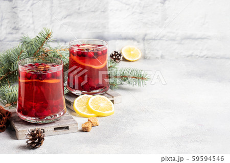 Cranberry juice with lemon and cane sugar. Winter hot drink. Copy space 59594546