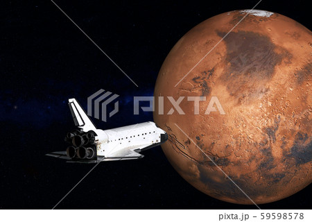 Space shuttle close to the Mars planet 59598578