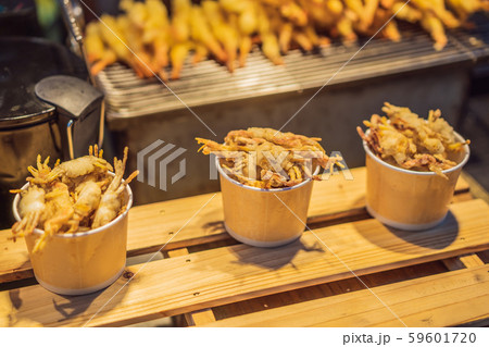 Typical Korean street food on a walking street of Seoul. Spicy fast food simply found at local 59601720