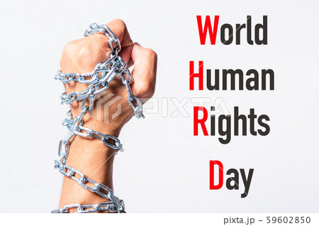 Chained fist hands with WORLD HUMAN RIGHTS DAY 59602850