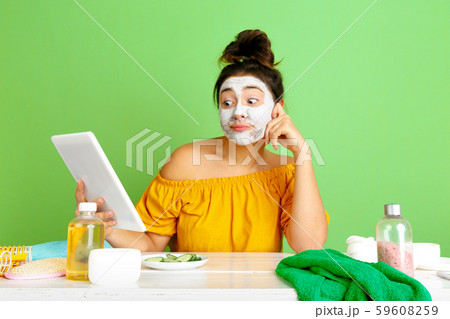 Portrait of young caucasian woman in her beauty day and skin care routine 59608259