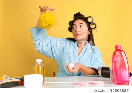 Portrait of young caucasian woman in her beauty day and skin care routine Portrait of young caucasian woman in her beauty day and skin care routine 59608627