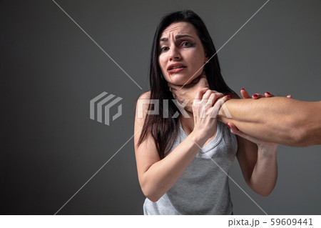 Woman being under domestic abuse and violence, concept of female rights Woman being under domestic abuse and violence, concept of female rights 59609441