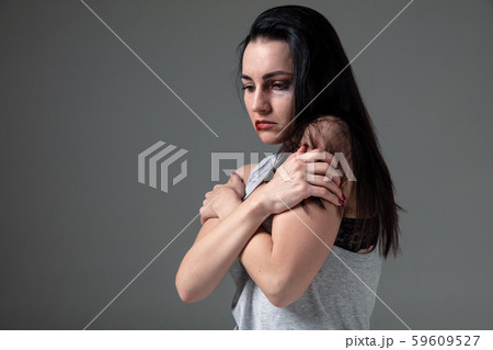 Woman in fear of domestic abuse and violence, concept of female rights Woman in fear of domestic abuse and violence, concept of female rights 59609527