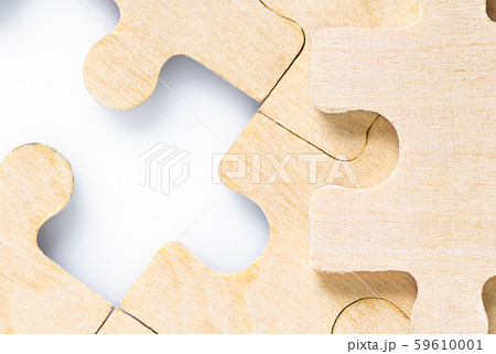 Missing jigsaw puzzle pieces on white 59610001