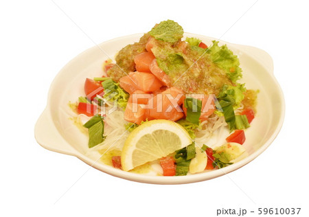 fresh salmon with vegetable spicy sauce salad on plate 59610037