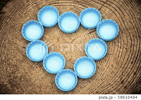 bottle cap wooden stub background  59610494
