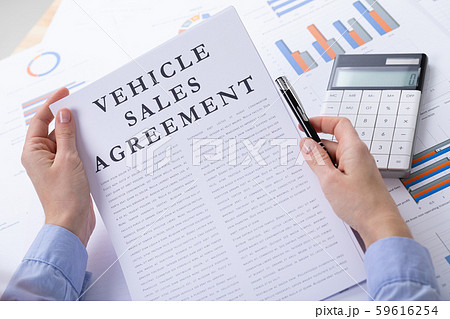 vehicle sales agreement concept, documents on the desktop 59616254
