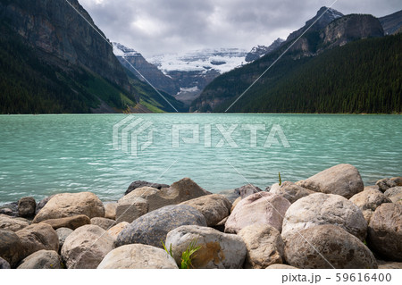 Lake Louise on a cloudy day, Banff National Park, Alberta, Canada 59616400
