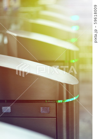 Turnstiles in the subway. Access system of public transport in the city. Urban image. Turnstiles in the subway. Access system of public transport in the city. Urban image. 59618009