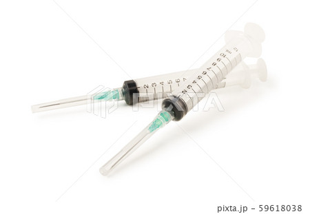 Two syringes closeup isolated 59618038