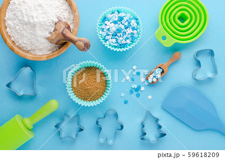 ingredients and kitchen tools for baking on blue background, flat lay ingredients and kitchen tools for baking on blue background, flat lay 59618209