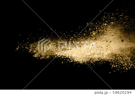 Golden powder explosion on black background. Freeze motion.  59620294