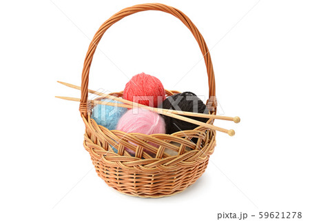 Wool balls in a basket isolated on a white Wool balls in a basket isolated on a white 59621278