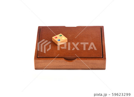 Chip from the puzzle mosaic on a closed box. 59623299