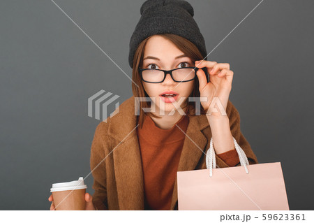 Young girl teenager isolated portrait shopping concept 59623361