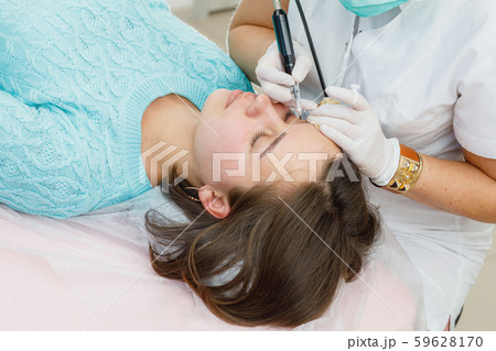 Permanent makeup, tattooing of eyebrows Permanent makeup, tattooing of eyebrows 59628170
