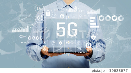 5G network with man holding a tablet 59628677