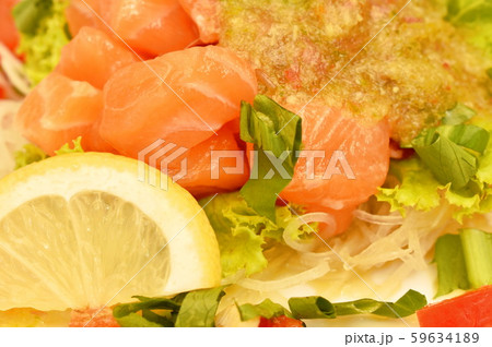 fresh salmon with vegetable spicy sauce salad on plate fresh salmon with vegetable spicy sauce salad on plate 59634189