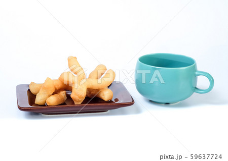 Fried bread traditional food on dish with coffee Fried bread traditional food on dish with coffee 59637724