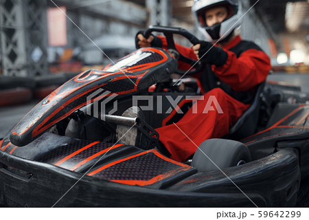 Kart racer enters the turn, karting auto sport 59642299