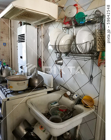 mess and dump. An old room with lots of things. mess and dump. An old room with lots of things. 59642548