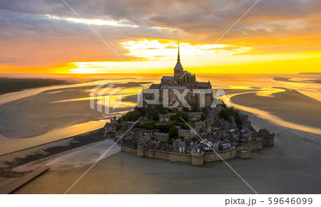 Mont Saint-Michel view in the sunrise light. Normandy, northern France Mont Saint-Michel view in the sunrise light. Normandy, northern France 59646099