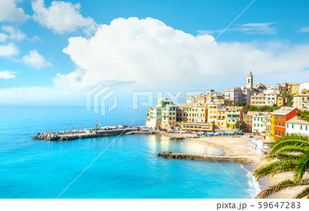 View of Bogliasco. Bogliasco is a ancient fishing village in Italy, Genoa, Liguria. Mediterranean Sea, sandy beach and architecture of Bogliasco town. View of Bogliasco. Bogliasco is a ancient fishing village in Italy, Genoa, Liguria. Mediterranean Sea, sandy beach and architecture of Bogliasco town. 59647283