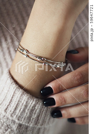 Tender jewerly on female hand, close up shot 59647721