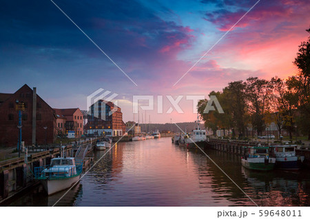 Sunset in the Klaipeda port, Lithuania. 59648011