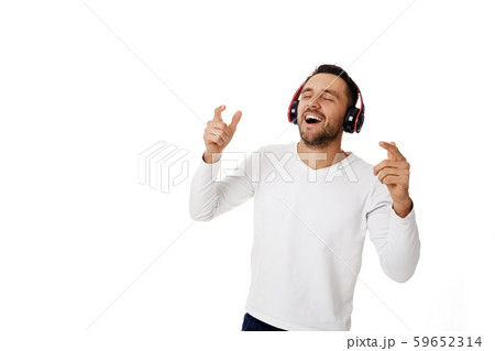 young man in headphones listening to music 59652314