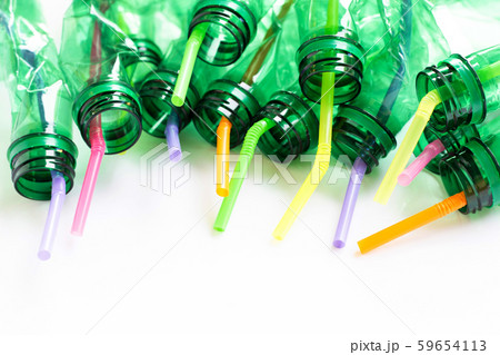 Plastic bottles with plastic straws on white Plastic bottles with plastic straws on white 59654113