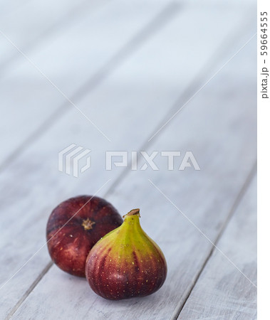 Ripe Fig Fruits On White Wooden 59664555