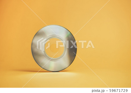 Close up Beautiful Old mini disk on yellow Close up Beautiful Old mini disk on yellow 59671729