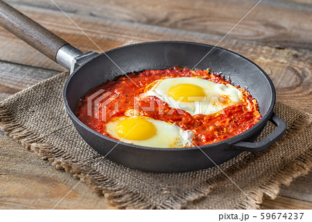 Shakshouka served in a frying pan Shakshouka served in a frying pan 59674237