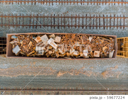 Scrap metal iron from many things in wagons. 59677224