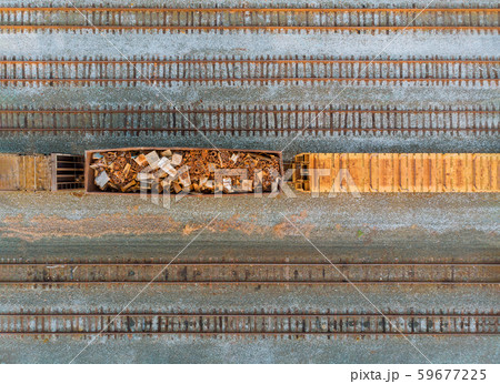 Railway wagon with metal scrap old rusty corroded 59677225