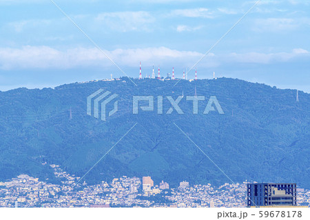 大阪 東大阪の街並みと生駒山テレビ塔の写真素材